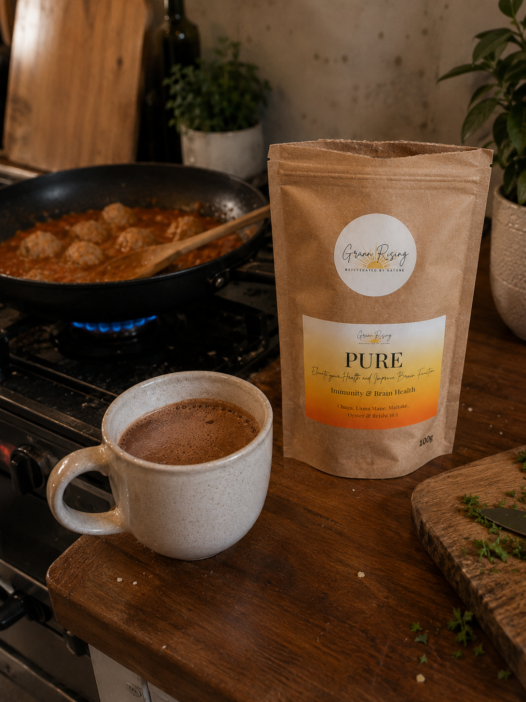 Warm cacao with PURE beside a stovetop dinner