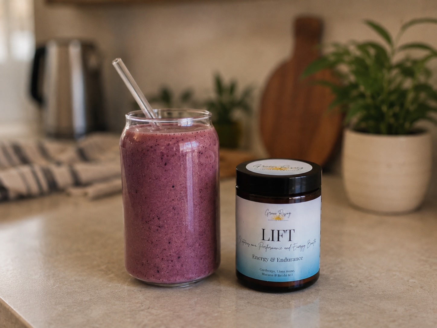 LIFT smoothie in a glass beside the LIFT blend on a kitchen counter